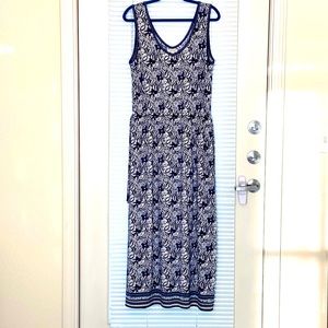 Maxi dress, sleeveless with drawstring waist ties on sides.